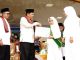 Wakaf Tahfizd Siswa Madrasah se Kab. Tanah Datar, Bupati Serahkan Reward Umrah